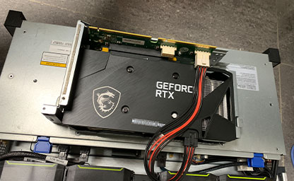 A GeForce RTX GPU put on top of a server.